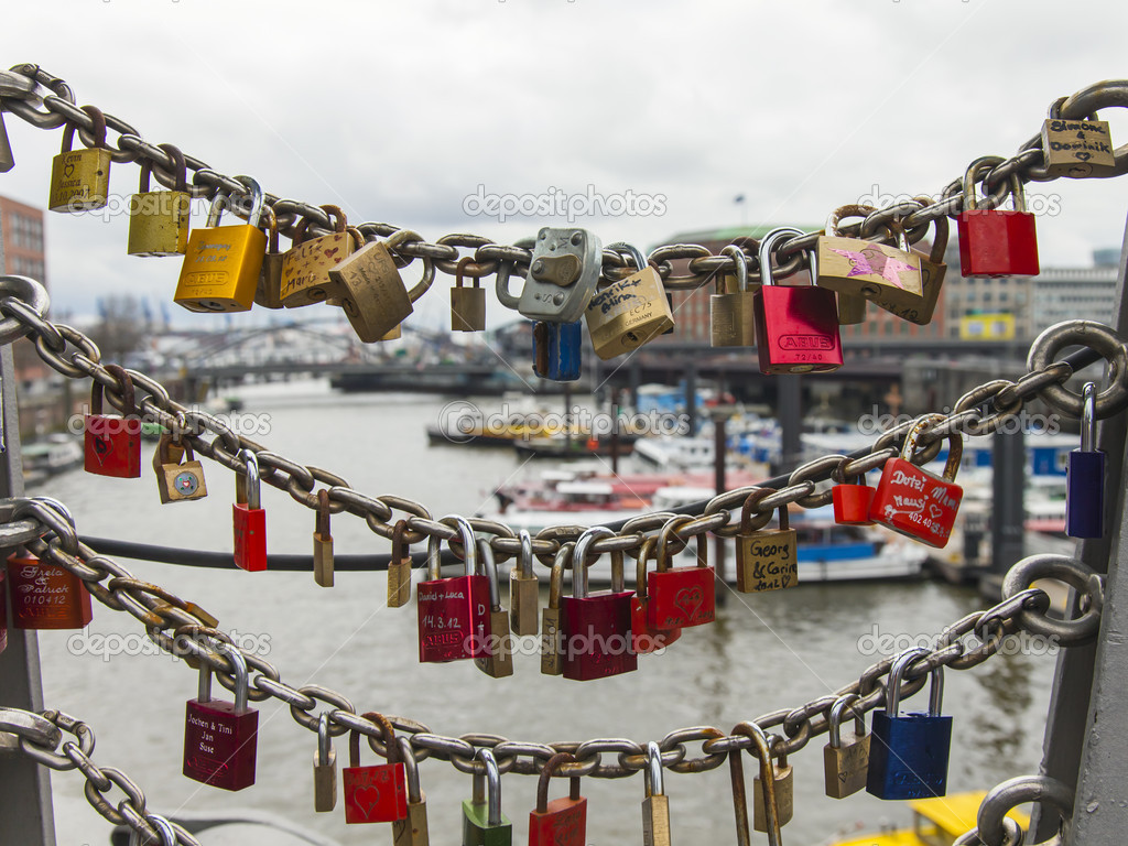 Hamburg, Germany , February 19, 2013 . Traditional wedding locks on the bridge over the canal