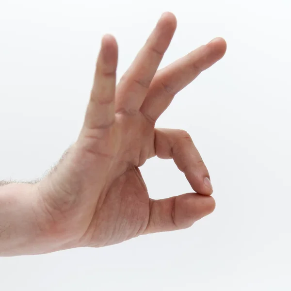 Las manos de los hombres. Un gesto común. Signos y símbolos de emociones — Foto de Stock
