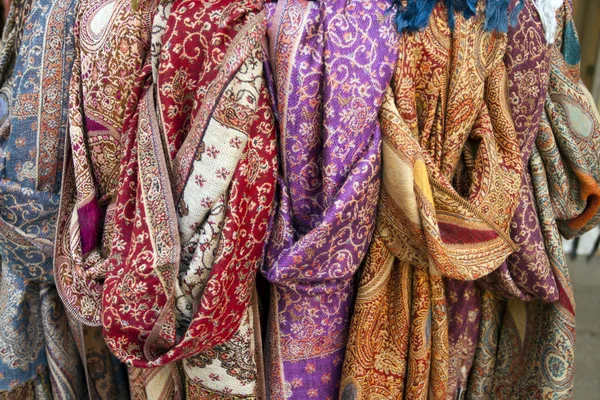 Colorful scarves on display in store — Stock Photo, Image