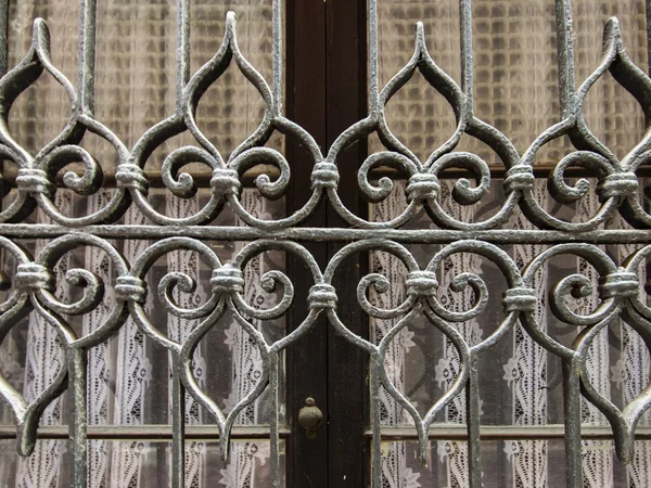 Venice, Italy. Vintage openwork lattice on the window of an old house — Stock Photo, Image