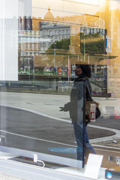 Vienna , Austria , 29 October 2011 . Reflection of houses in a shop window — Stock Photo, Image