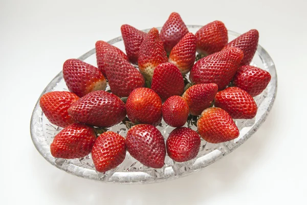 Large ripe strawberry berries on a large platter — Stock Photo, Image