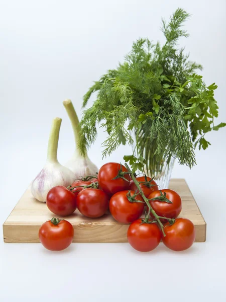 Fresh vegetables for salad: tomato, dill, parsley , garlic — Stock Photo, Image