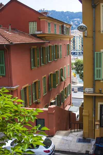 Nice, France, on July 3, 2011. Typical urban view in the summer afternoon. Tourists and citizens go down the street — Stock Photo, Image