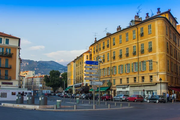 Nice, France, on July 3, 2011. Typical urban view in the summer afternoon. Tourists and citizens go down the street — Stock Photo, Image