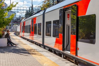 Sochi, Russia, October 20, 2021.  regional express Lastochka near platform