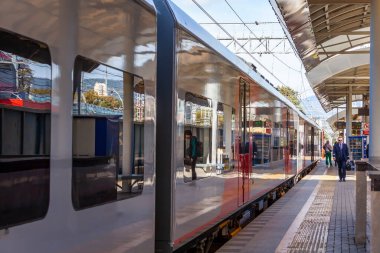 Sochi, Russia, October 20, 2021.  regional express Lastochka near platform