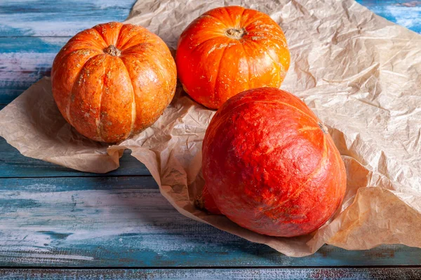 Three Pumpkins Different Varieties Table — Stockfoto