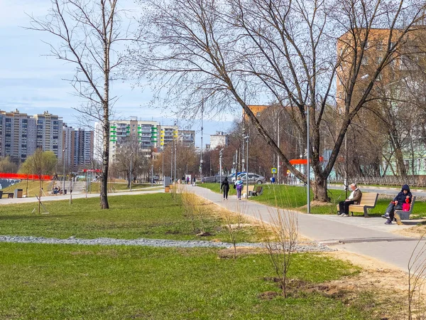 Pushkino, Russia, April 26, 2021. Recreation area on the picturesque bank of the Serebryanka river.