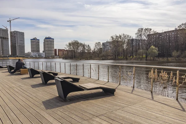 Pushkino, Russia, April 26, 2021. Recreation area on the picturesque bank of the Serebryanka river.