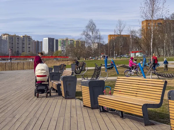 Pushkino, Russia, April 26, 2021. Recreation area on the picturesque bank of the Serebryanka river.