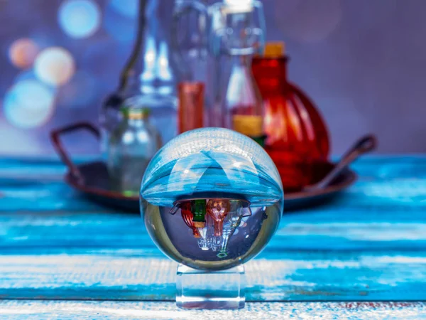 Vintage Glass Bottles Vintage Metal Tray Glass Sphere Table — Stock Photo, Image