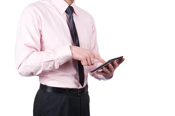 Jonge man met behulp van digitale tablet geïsoleerd op witte achtergrond — Stockfoto