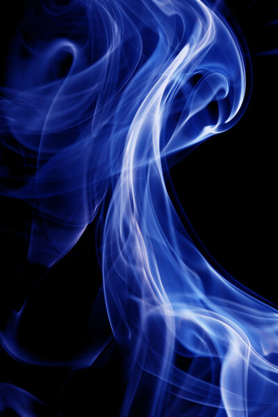 Blue smoke in black background