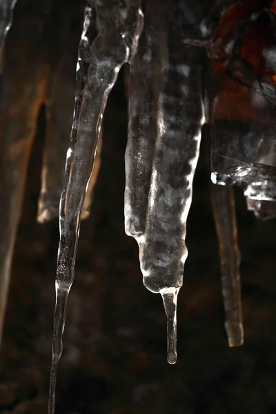 Icicles on dark background — Stock Photo, Image