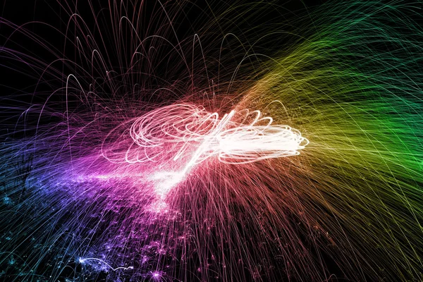 Showers of hot glowing sparks — Stock Photo, Image