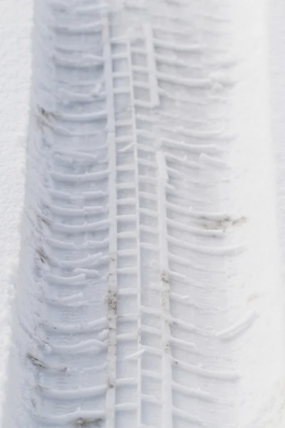 Prints of wheels on a snow — Stock Photo, Image