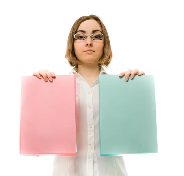 Picture of a girl in white holding two folders — Stock Photo, Image