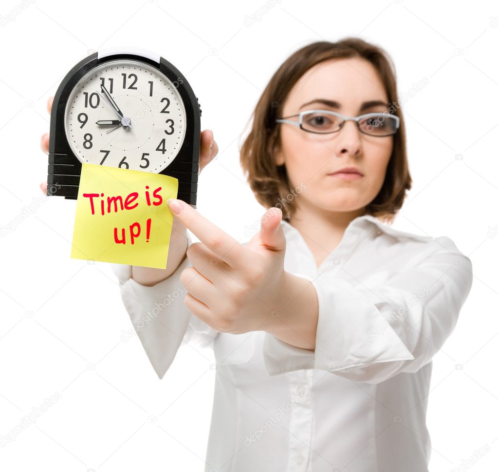 Girl points to clock (focus on clock)