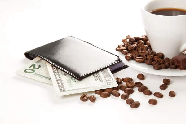 Una tazza di caffè, semi, caramelle e denaro — Foto Stock