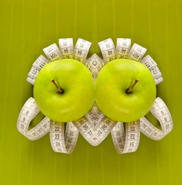 Az apple és a mérőszalag képe — Stock Fotó