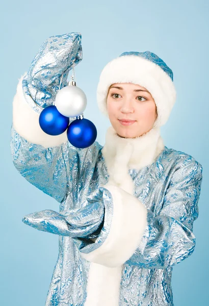 Girl in costume with new year toys — Stock Photo, Image