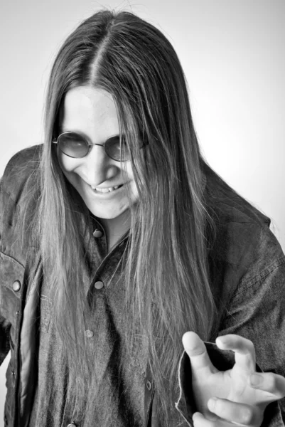 Man in sunglasses and long hair — Stock Photo, Image