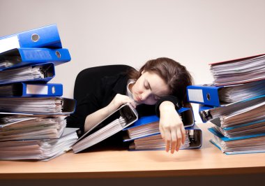 Businesswoman sleeping at office clipart