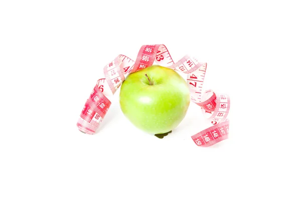 Picture of green apple and measure tape — Stock Photo, Image