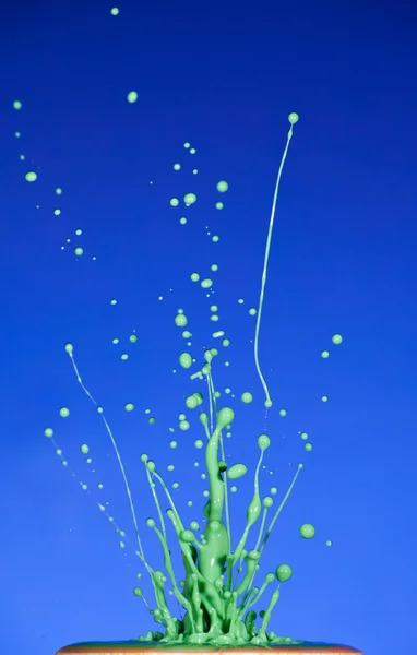 Splash of green liquid — Stock Photo, Image