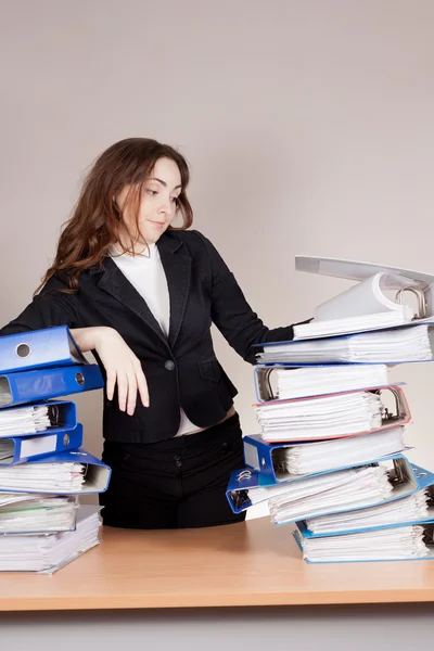 Woman with tons of folders — Stock Photo, Image