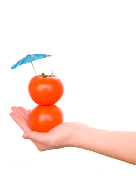 Due pomodori con paglia e ombrellone da cocktail — Foto Stock