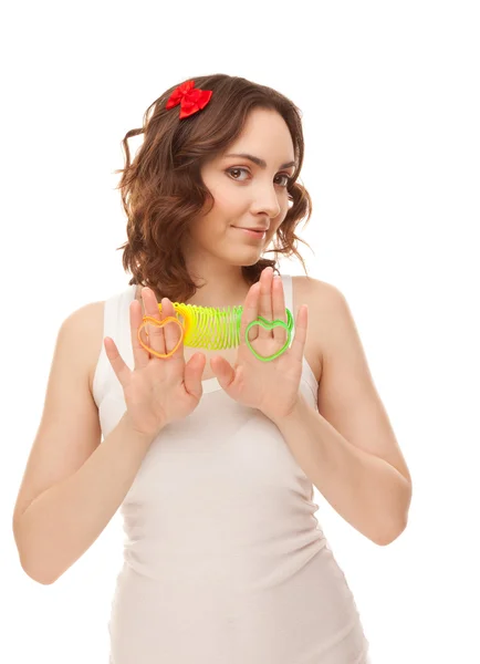 Beautiful woman with heart shaped toys — Stock Photo, Image