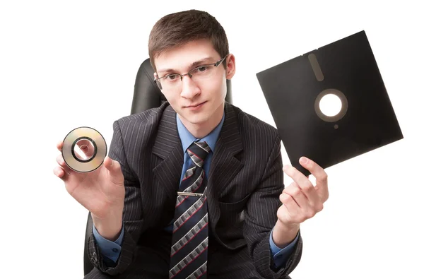 Young man with floppy disk — Stock Photo, Image