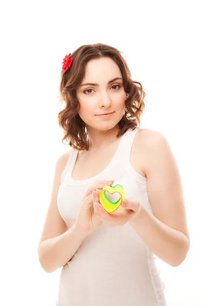 Beautiful woman with heart shaped toys — Stock Photo, Image