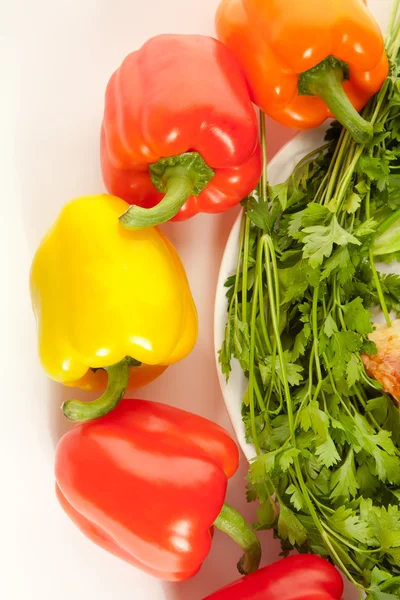 Picture of peppers with palte of parsley — Stock Photo, Image