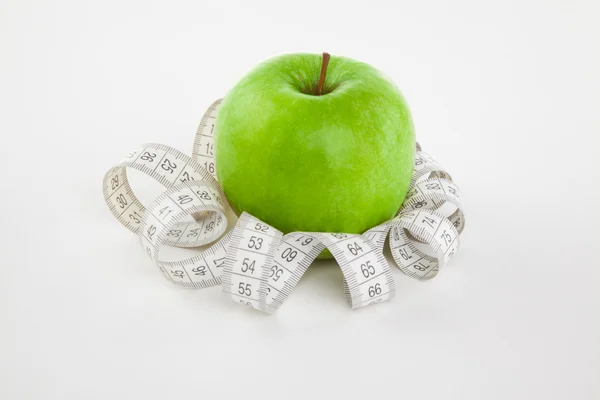 Imagen de manzana y cinta métrica —  Fotos de Stock