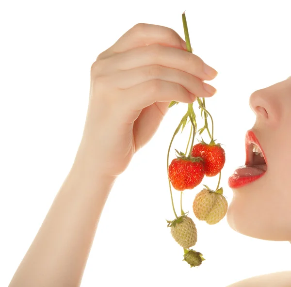 Beautiful woman's lips with strawberry — Stock Photo, Image