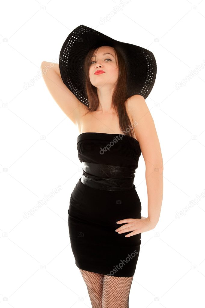 Beautiful woman in little black dress isolated on white