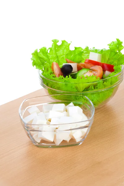 Picture of plates with greek salad and feta — Stock Photo, Image