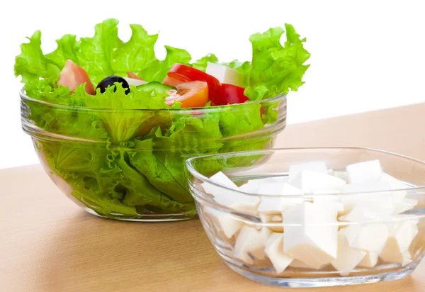 Picture of plates with greek salad and feta — Stock Photo, Image