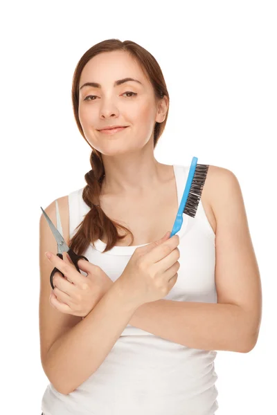 Hairdresser holding a scissors and comb — Stock Photo, Image