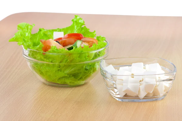 Picture of plates with greek salad and feta — Stock Photo, Image