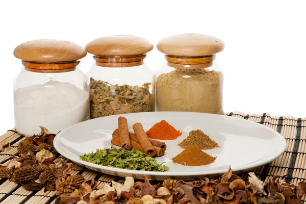 Picture of a plate with different spices on the table — Stock Photo, Image