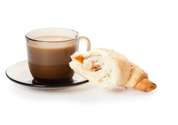 A cup of coffee and a cornetto — Stock Photo, Image