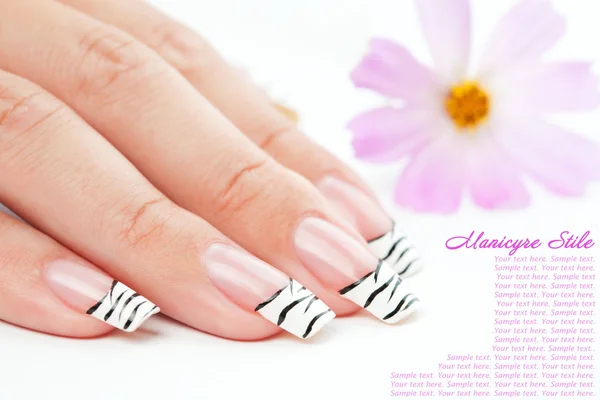 Manicure relaxing with flowers — Stock Photo, Image