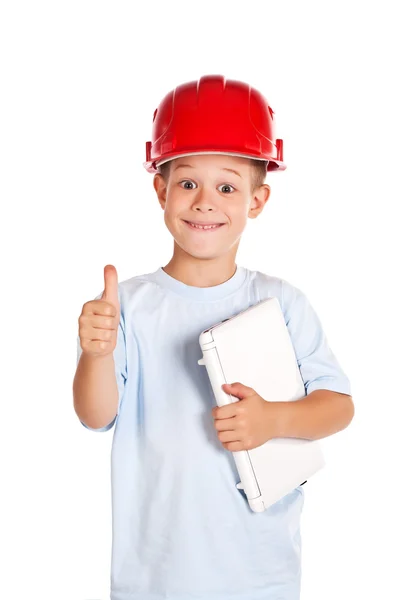 Little boy with note and in hard hat — Stock Photo, Image