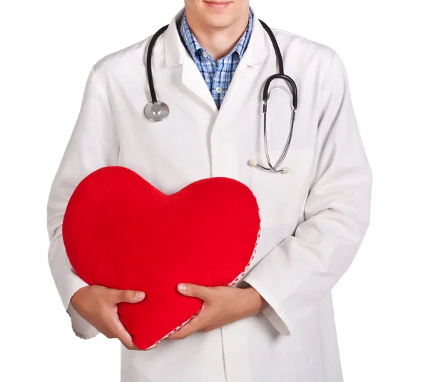 Doctor in a white coat with a red heart Stock Image