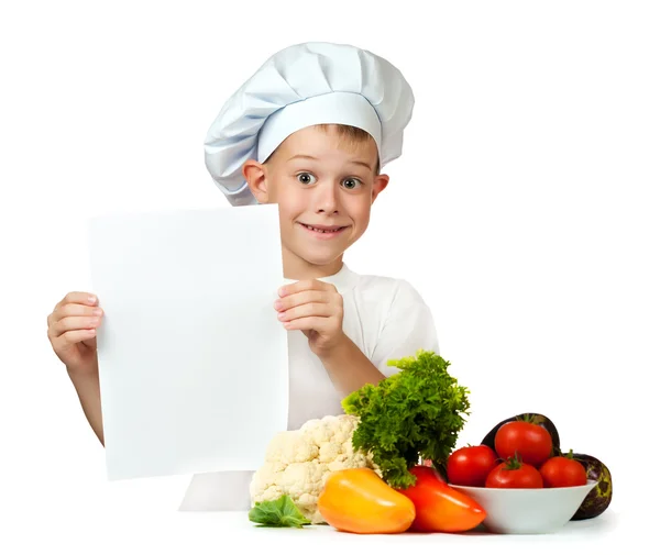 Cute boy Chef is holding with a sheet of paper. isolated — Stock Photo, Image