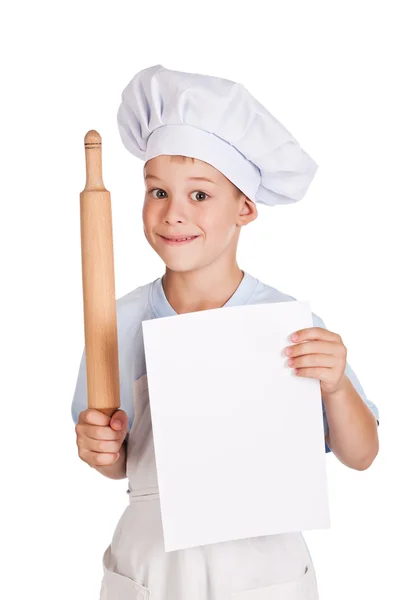 Boy Chef está segurando com uma folha de papel — Fotografia de Stock